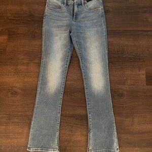 Two pair Express skyscraper jeans